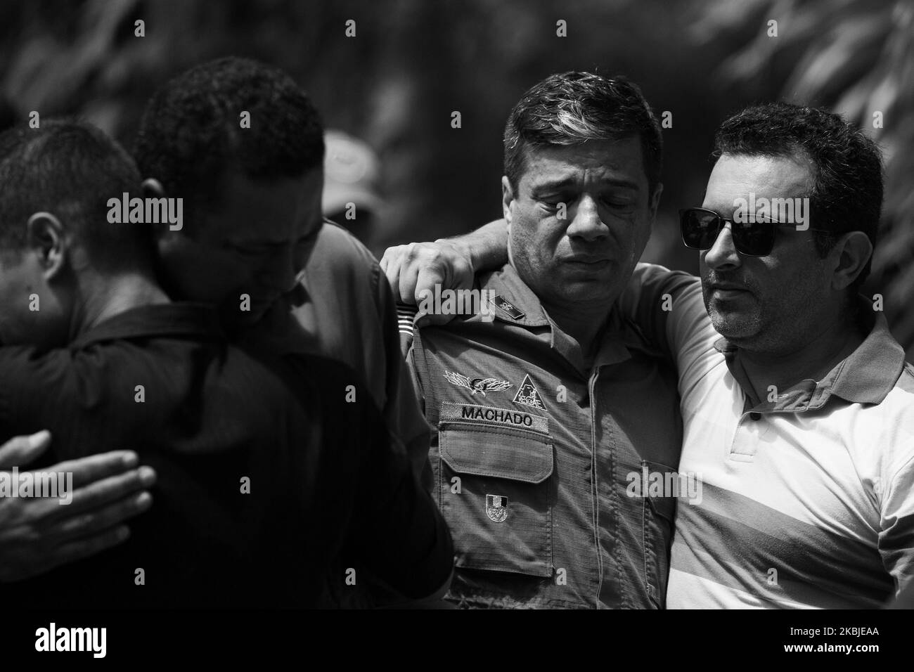 (EDITOR'S NOTE: Image was converted to black and white) Firefighter Rogerio de Moraes Santos funeral at Cemiterio Saudade e Funeraria Municipal Vila Julia in Guaruja, Brazil, March 4, 2020. Corporal Moraes died during an operation at Morro do Macaco Pelado in the early hours of Tuesday, March 3, 2020. (Photo by Felipe Beltrame/NurPhoto) Stock Photo