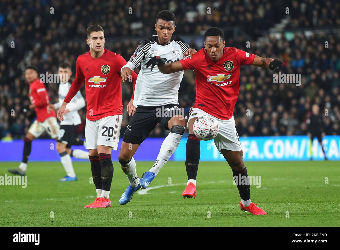 Anthony Martial (9) of Manchester United battles with Morgan Whittaker (49) of Derby County during the FA Cup match between Derby County and Manchester United at the Pride Park, Derby, England on 5th March 2020. (Photo by Jon Hobley/MI News/NurPhoto) Stock Photo