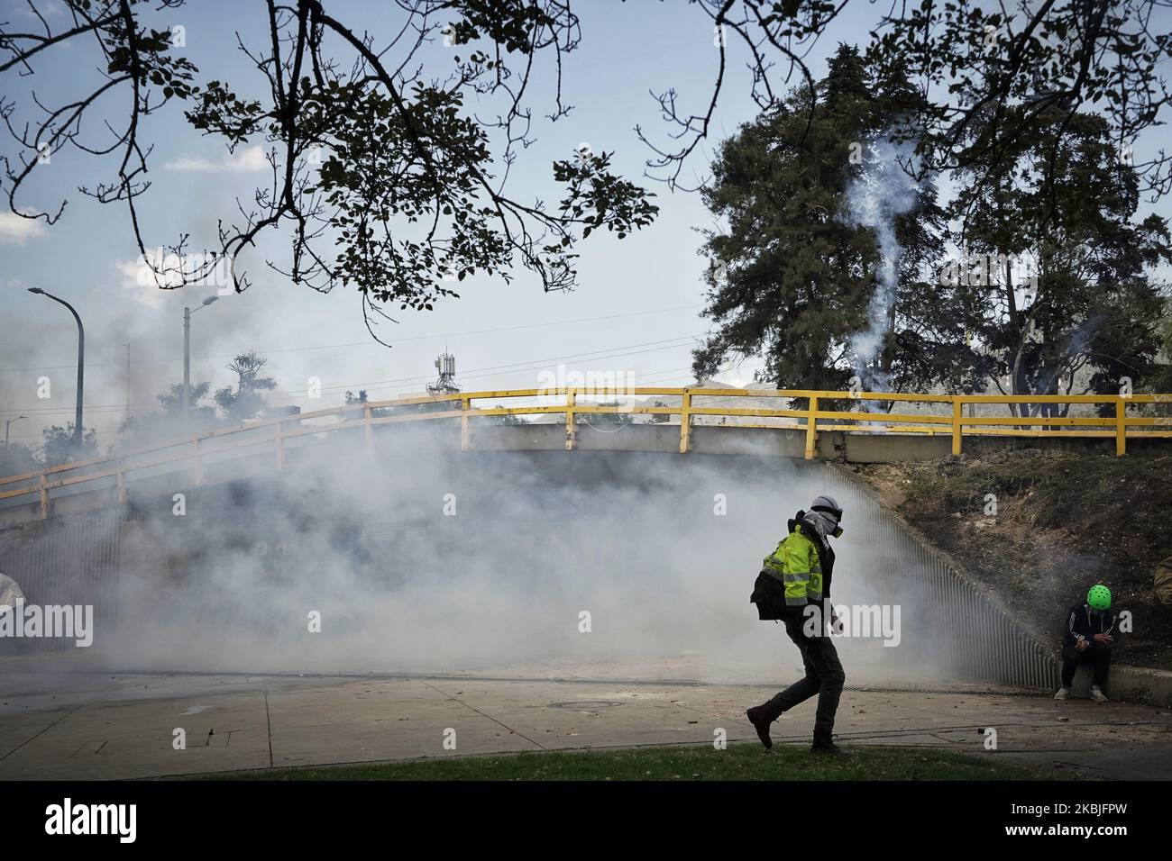 Protesters clash with Colombian riot police at the 'Universidad Nacional' during a demonstration against the government of Colombia's President Ivan Duque in Bogota, on March 6, 2020. (Photo by Diego Cuevas/NurPhoto) Stock Photo