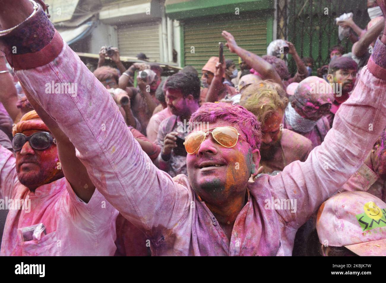 Devotees celebrate Holi festival in Kolkata, India, 08 March, 2020. The Hindu Festival of Holi, also known as festival of colours which symbolises the beginning of Spring season and worship Lord Krishna (A Hindu God). (Photo by Indranil Aditya/NurPhoto) Stock Photo