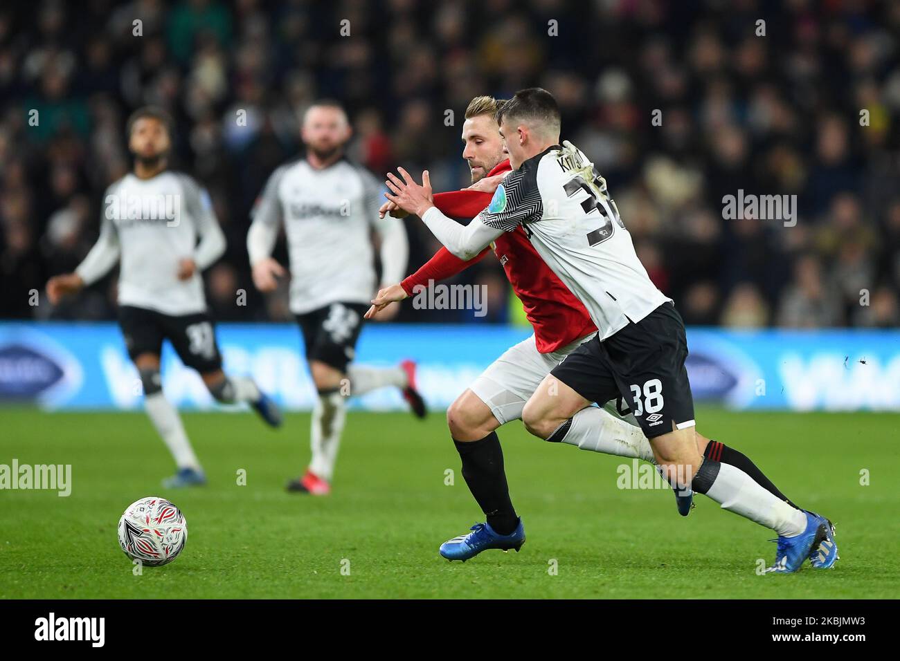 Jason Knight (38) of Derby County battles with Luke Shaw (23) of Manchester United during the FA Cup match between Derby County and Manchester United at the Pride Park, Derby on Thursday 5th March 2020. (Photo by Jon Hobley/MI News/NurPhoto) Stock Photo