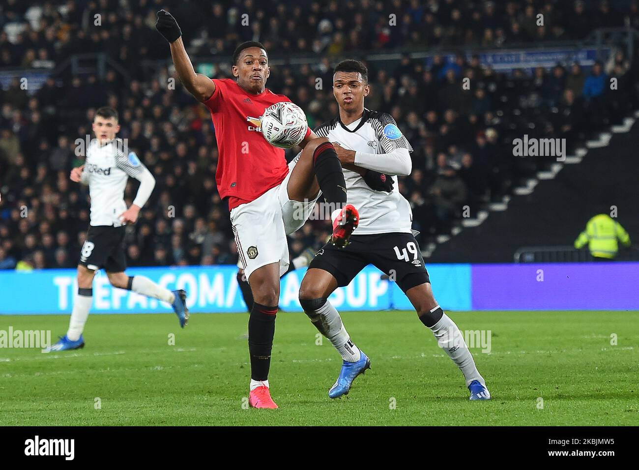 Anthony Martial (9) of Manchester United and Morgan Whittaker (49) of Derby County during the FA Cup match between Derby County and Manchester United at the Pride Park, Derby on Thursday 5th March 2020. (Photo by Jon Hobley/MI News/NurPhoto) Stock Photo