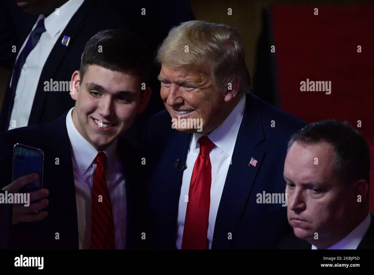 President Donald Trump greets supporters after a town hall, hosted by ...