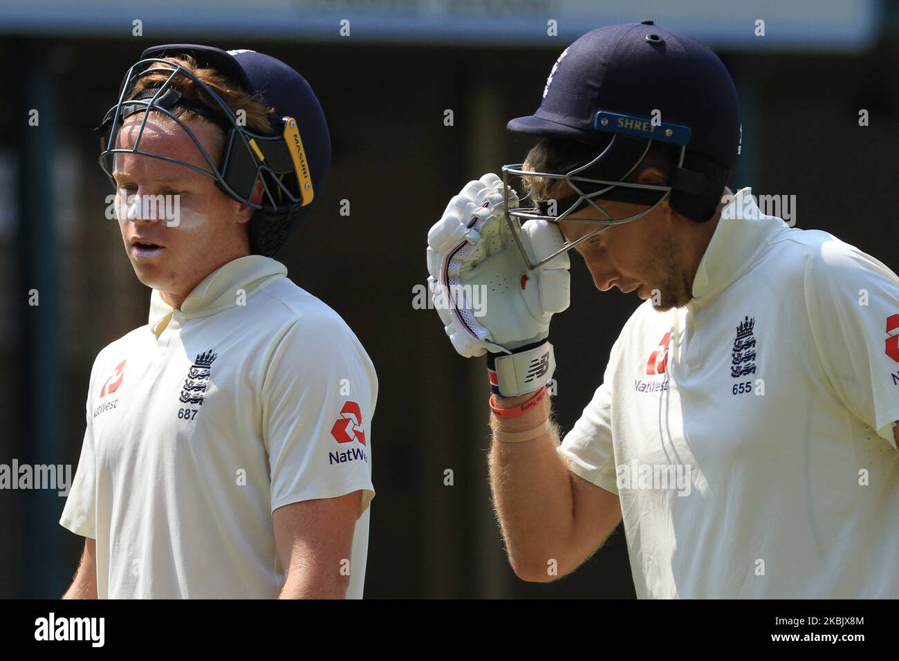 England cricket captain Joe Root and Ollie Pope leave the field at the tea break during the first day of the 2nd Warm up cricket match between Sri Lanka's Board President's XI and England at P Sara Oval on March 12, 2020 in Colombo, Sri Lanka. (Photo by Tharaka Basnayaka/NurPhoto) Stock Photo