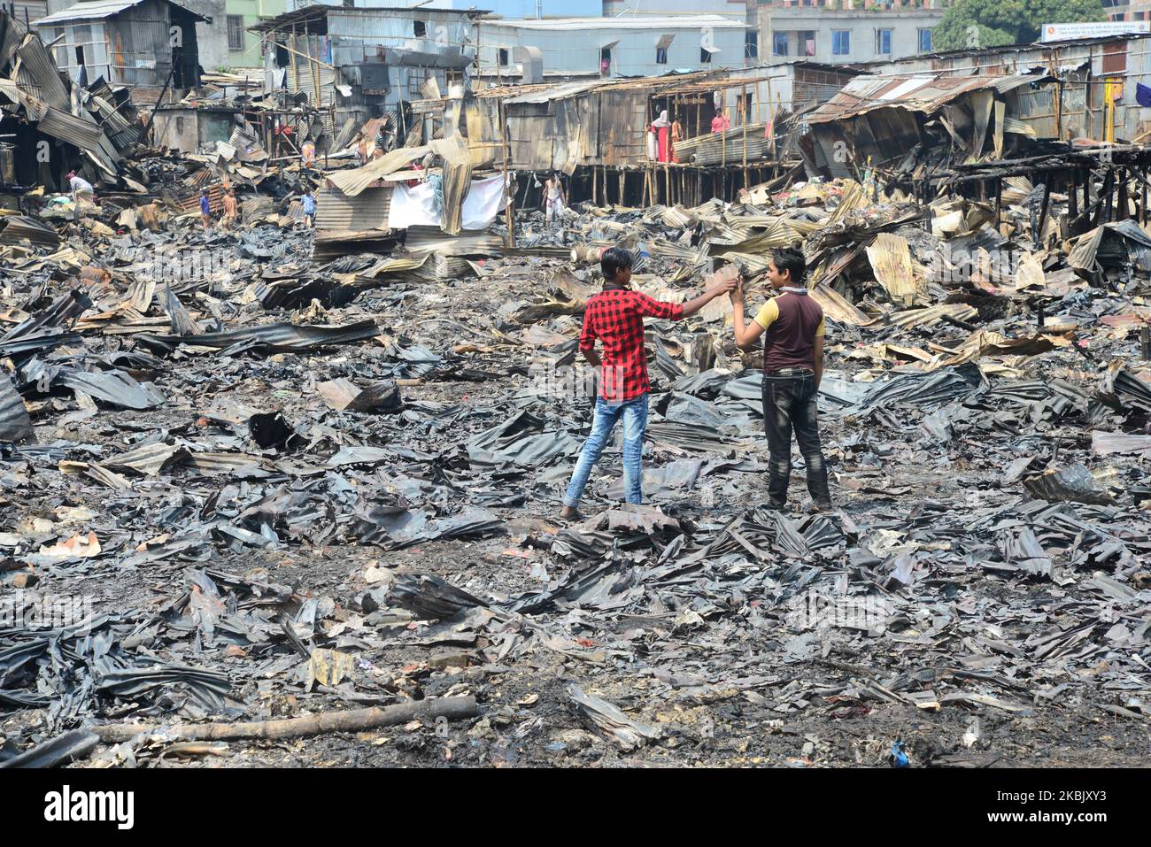 Out Rupnagar Bangladeshi Slum-dwellers have seen searching for their household ...