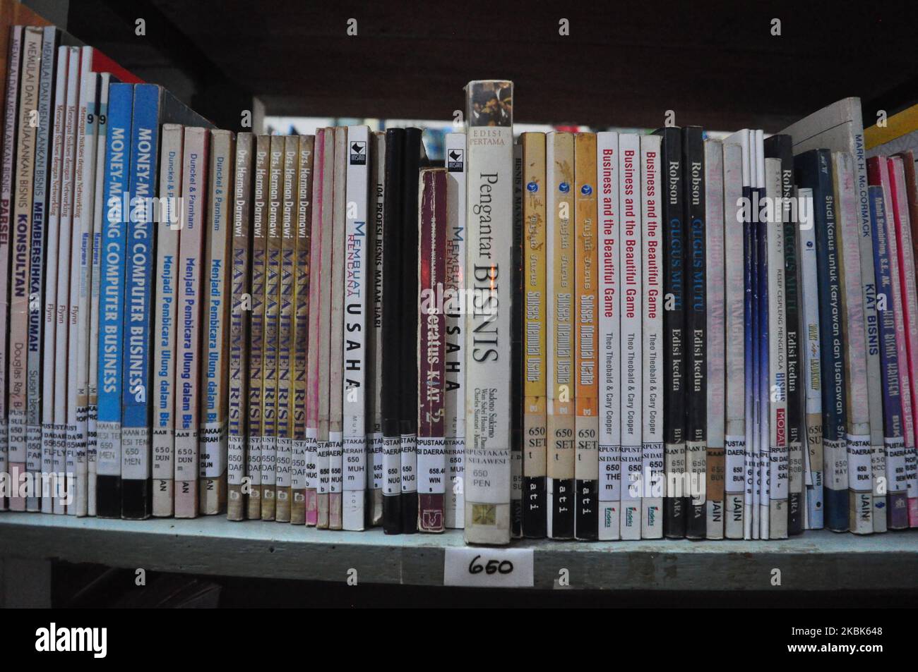 A row of books about business is still neatly stored in the regional library of Central Sulawesi Province, Indonesia, on March 18, 2020 due to none of them being read by visitors due to the concern of the local community not to be motivated outside the home as an effort to anticipate the spread of Corona Virus. Government Authority Health Central Sulawesi, has limited its citizens to activities outside the home, after there were four people treated because they were suspected of being infected with Covid-19. (Photo by Faldi Muhammad/NurPhoto) Stock Photo