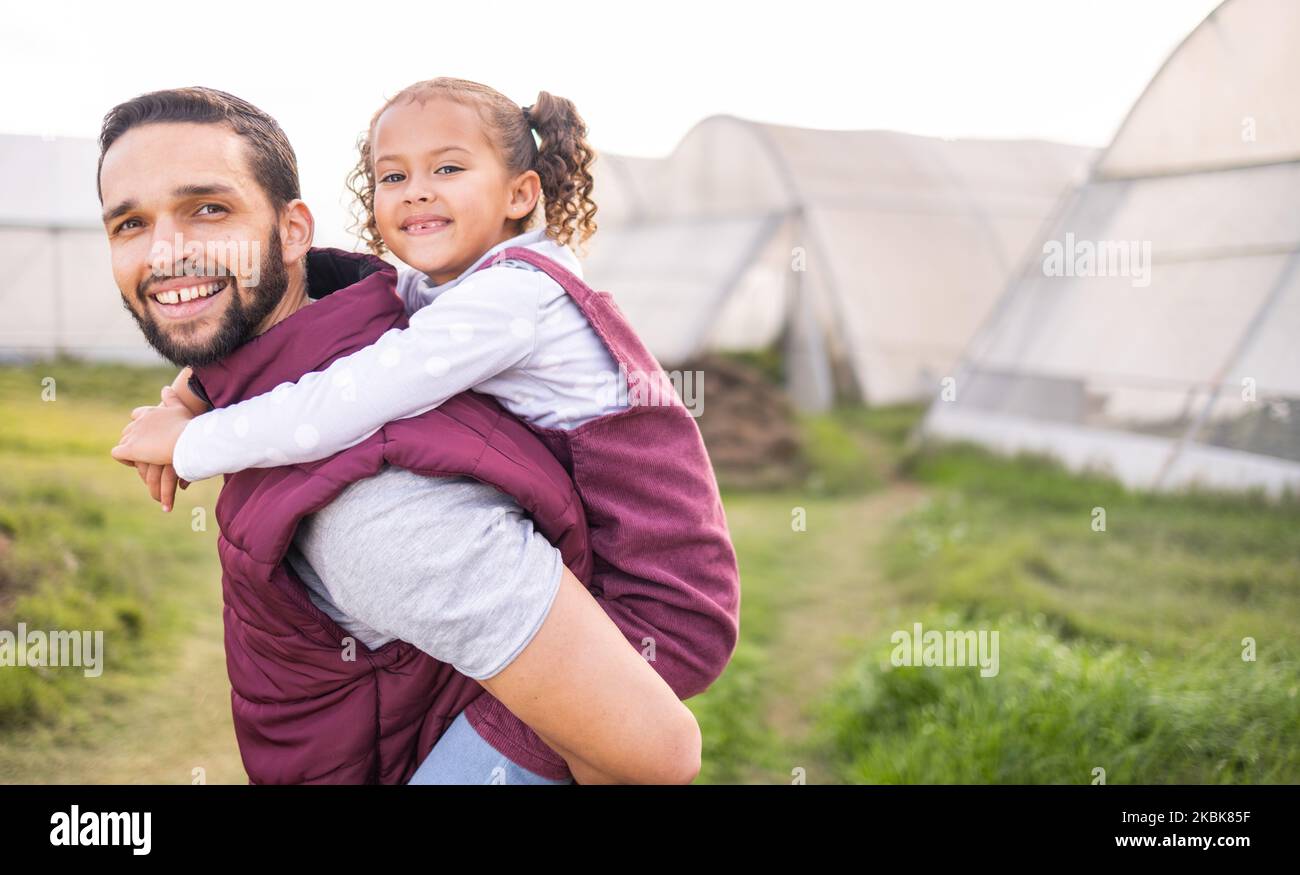 Agriculture, farming and family for piggy back with child and father at sustainable farm. Sustainability, growth and eco friendly lifestyle with Stock Photo
