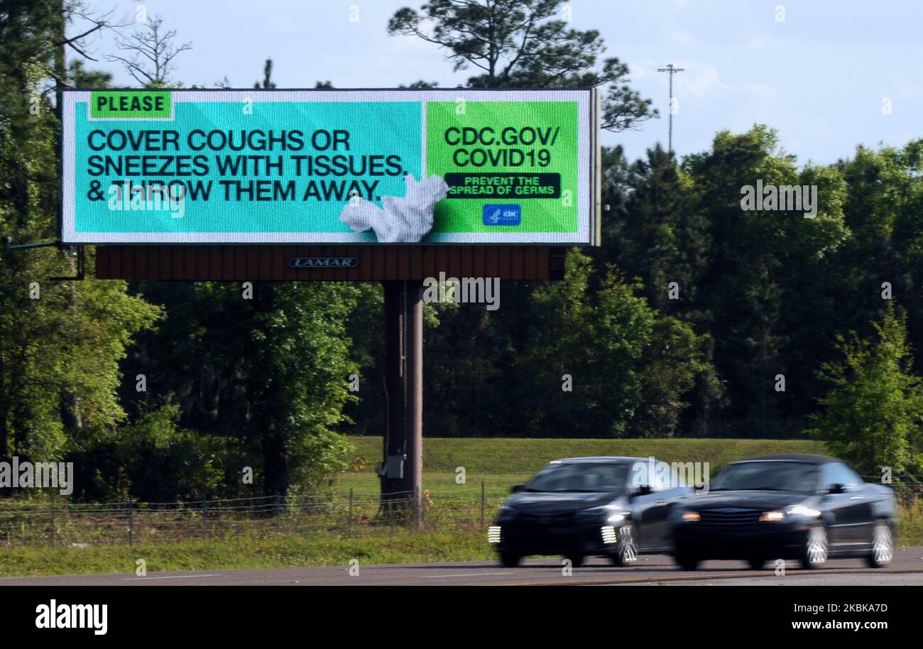 An electronic billboard sponsored by the Centers for Disease Control ...