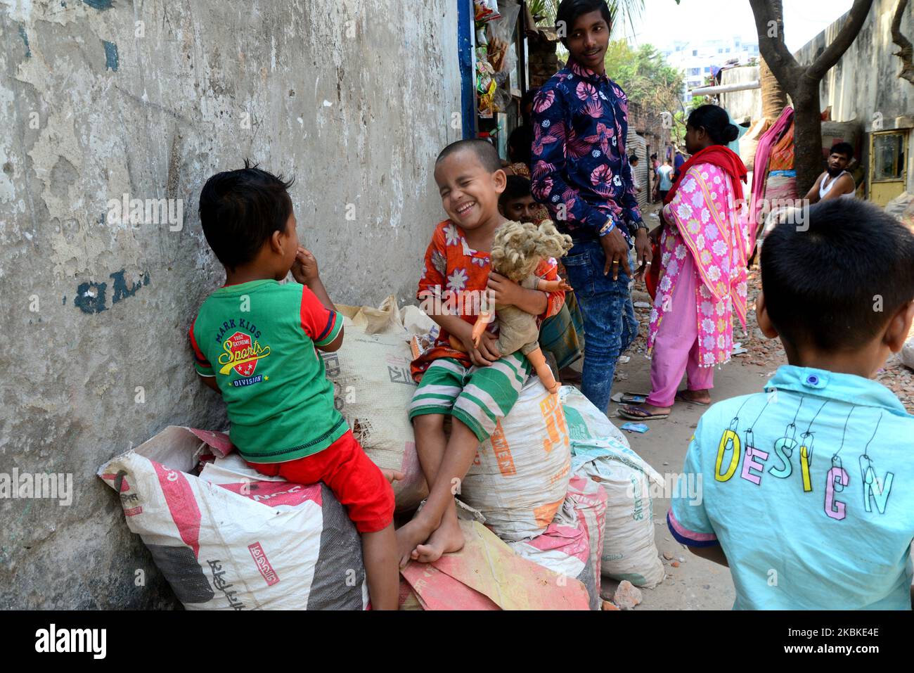 Bangladesh children playing in front of their house at a Mirpur Slum in
