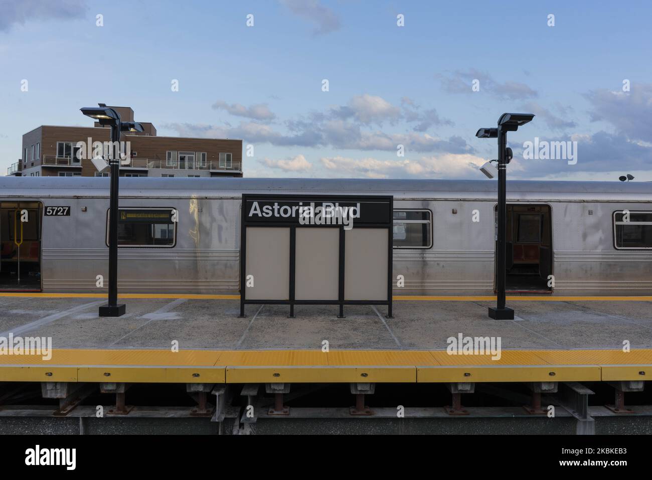 An empty train waits at Astoria Boulevard station on Friday, March 2020 in Queens, NY. The MTA has requested 4 billion dollars in federal funding to offset the ridership decline caused by the coronavirus. (Photo by Erin Lefevre/NurPhoto) Stock Photo