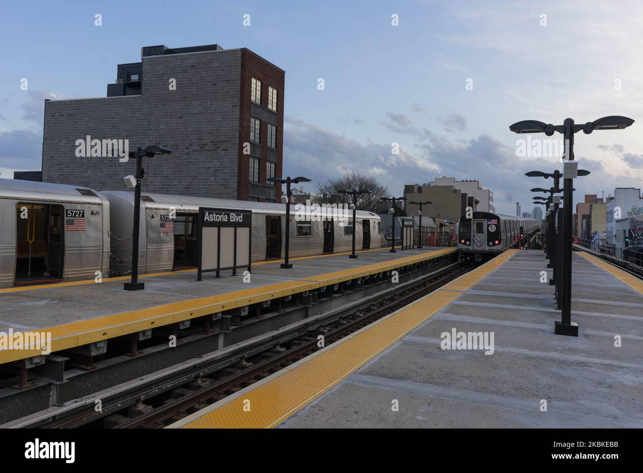 Empty trains wait at Astoria Boulevard station on Friday, March 2020 in Queens, NY. The MTA has requested 4 billion dollars in federal funding to offset the ridership decline caused by the coronavirus. (Photo by Erin Lefevre/NurPhoto) Stock Photo