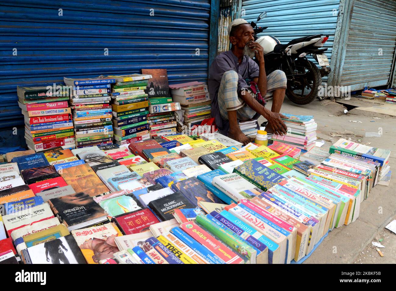 Bangladeshi book vendor hires stock photography and images Alamy