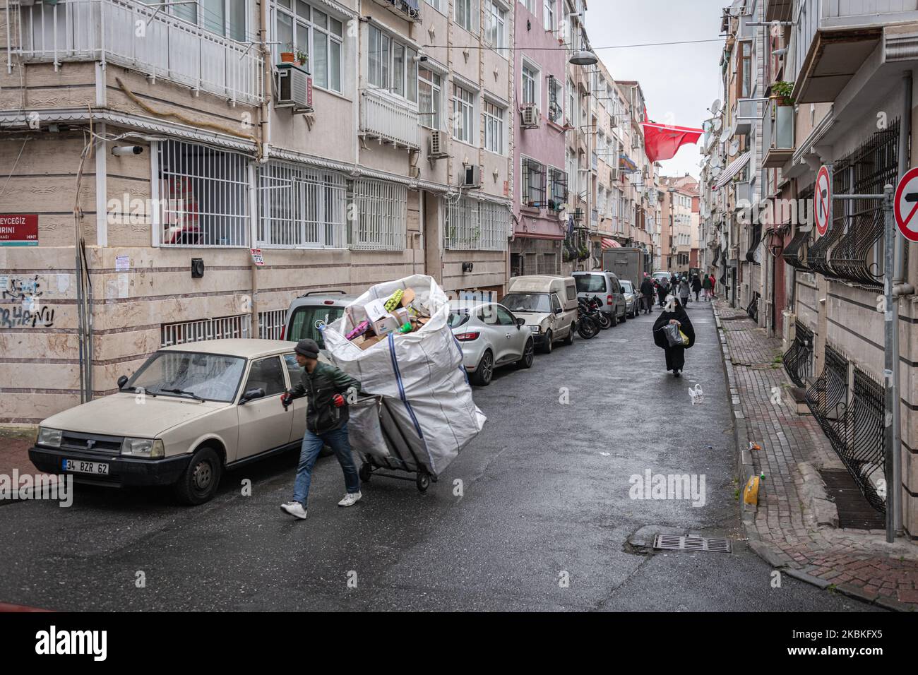 Garbage collector walks hi-res stock photography and images - Alamy
