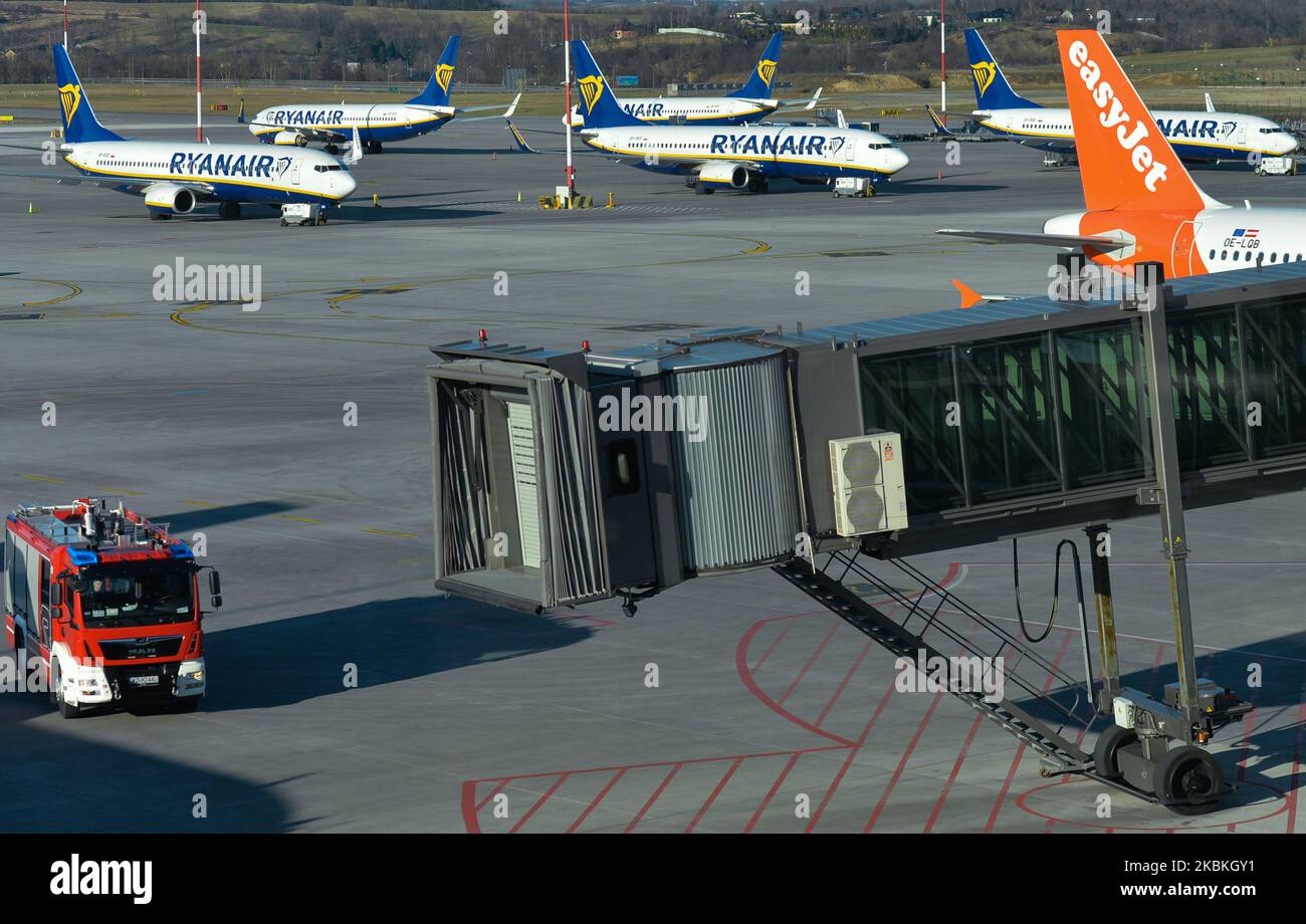 A view of Ryanair planes grounded at the John Paul II Krakow-Balice International Airport. Ryanair annouced grounding 90% of its flights until 2 April and will only operate a limited number of flights between Dublin, Cork and the UK, and daily or weekly flights from Dublin to Amsterdam, Brussels, Berlin, Lisbon and Cologne. The company also said it is working to provide repatriation and rescue flights for a number of EU governments and has offered its aircraft for emergency medical flights, including to and from China. On Wednesday, March 25, 2020, in Krakow, Poland. (Photo by Artur Widak/NurP Stock Photo