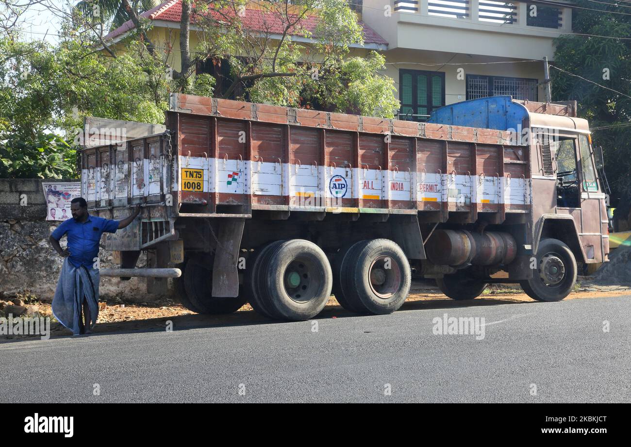 Truck driver stands by his lorry in Nagercoil, Tamil Nadu, India