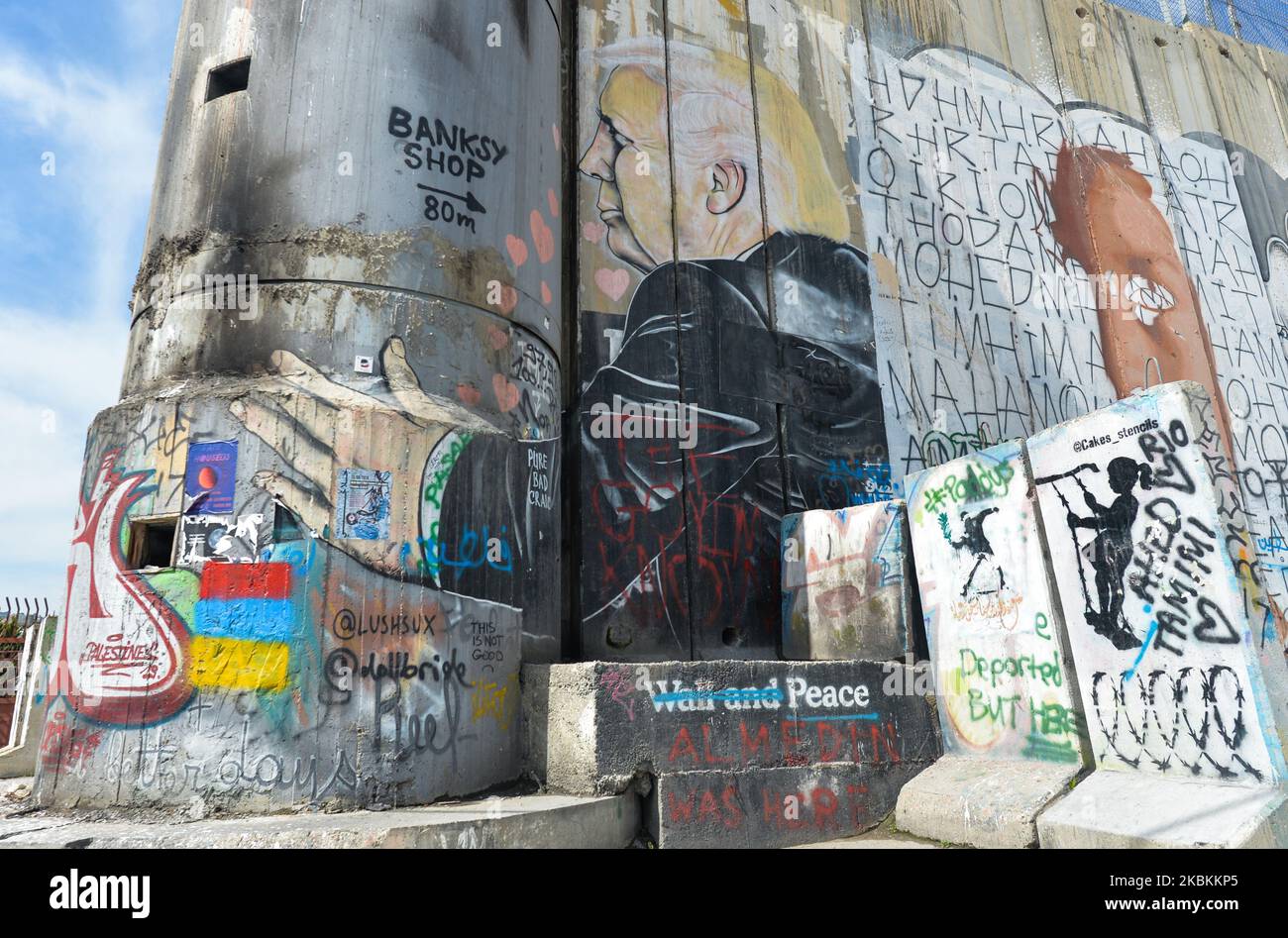 An image of Christ wearing a mask, an example of a mural painting on the wall separting Israel and the West Bank in Bethlehem. On Thursday, March 5, 2020, in Bethlehem, Palestine (Photo by Artur Widak/NurPhoto) Stock Photo