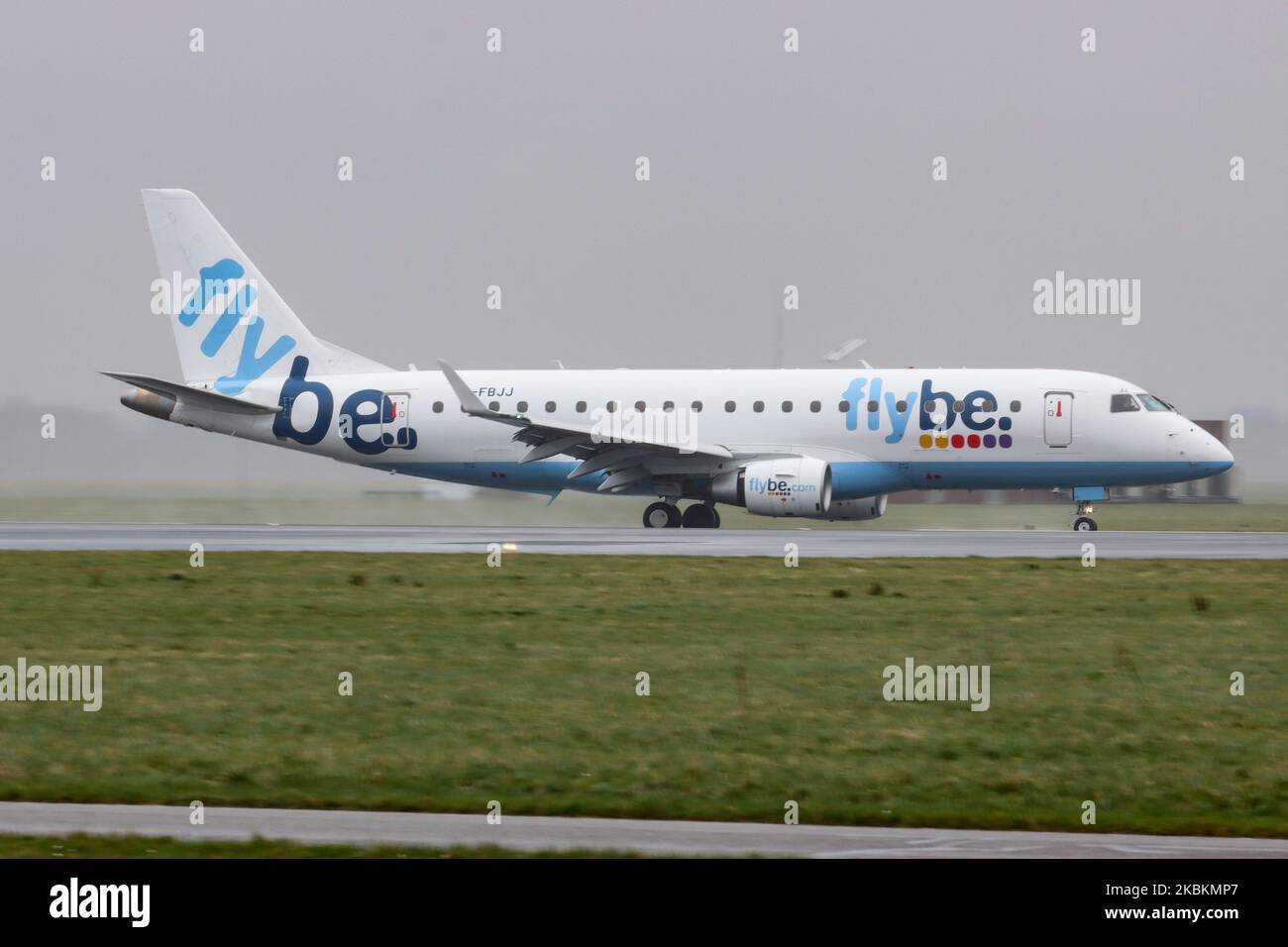 Flybe Embraer ERJ-175 aircraft as seen landing and taxiing at Amsterdam Schiphol International Airport. The Brazilian made airplane has the registration G-FBJJ. Flybe was a British commercial airline carrier with 63 planes fleet that ceased operations on March 5, 2020 because of financial problems and deterioration of passenger traffic because of Coronavirus Covid-19 pandemic. (Photo by Nicolas Economou/NurPhoto) Stock Photo