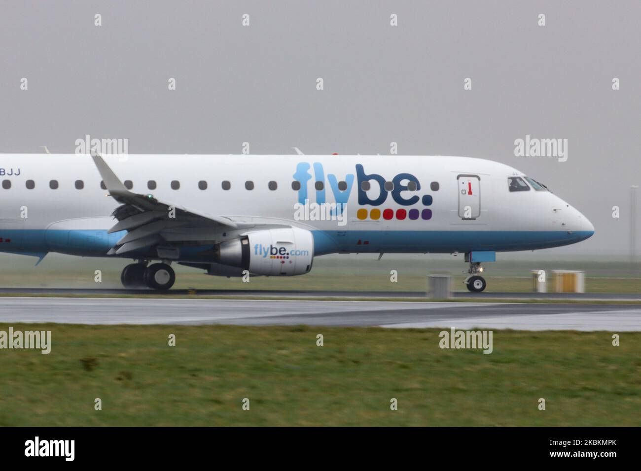 Flybe Embraer ERJ-175 aircraft as seen landing and taxiing at Amsterdam Schiphol International Airport. The Brazilian made airplane has the registration G-FBJJ. Flybe was a British commercial airline carrier with 63 planes fleet that ceased operations on March 5, 2020 because of financial problems and deterioration of passenger traffic because of Coronavirus Covid-19 pandemic. (Photo by Nicolas Economou/NurPhoto) Stock Photo