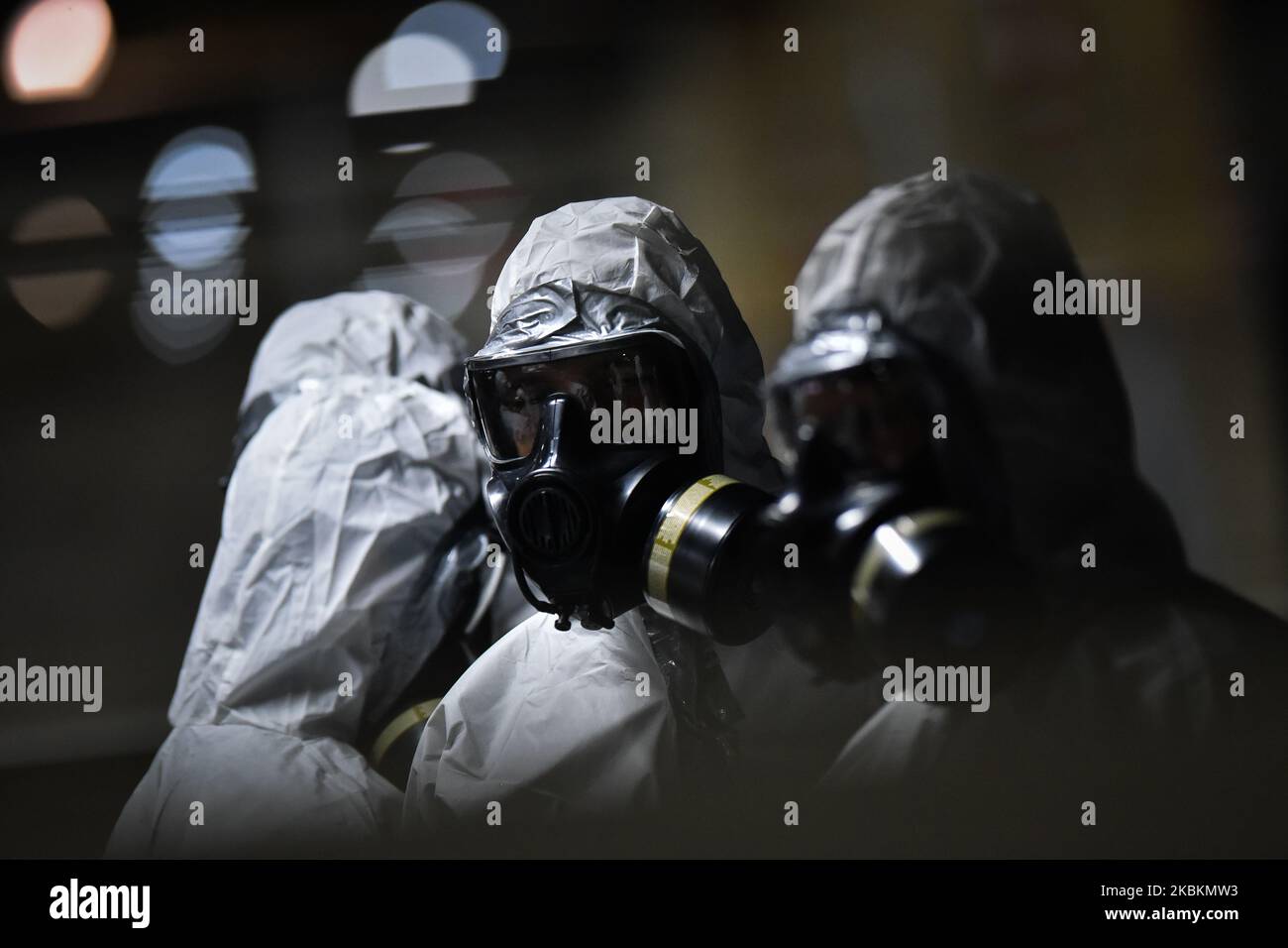 Military soldiers from the Brazilian Army's Chemical, Biological, Radiological and Nuclear Defense Company work on the disinfection of the Central Subway Station in Brasília, Brazil, on March 28, 2020. Decontamination actions in places with high passenger traffic are part of the prevention and fight against the Coronavirus (COVID-19). (Photo by Andre Borges/NurPhoto) Stock Photo