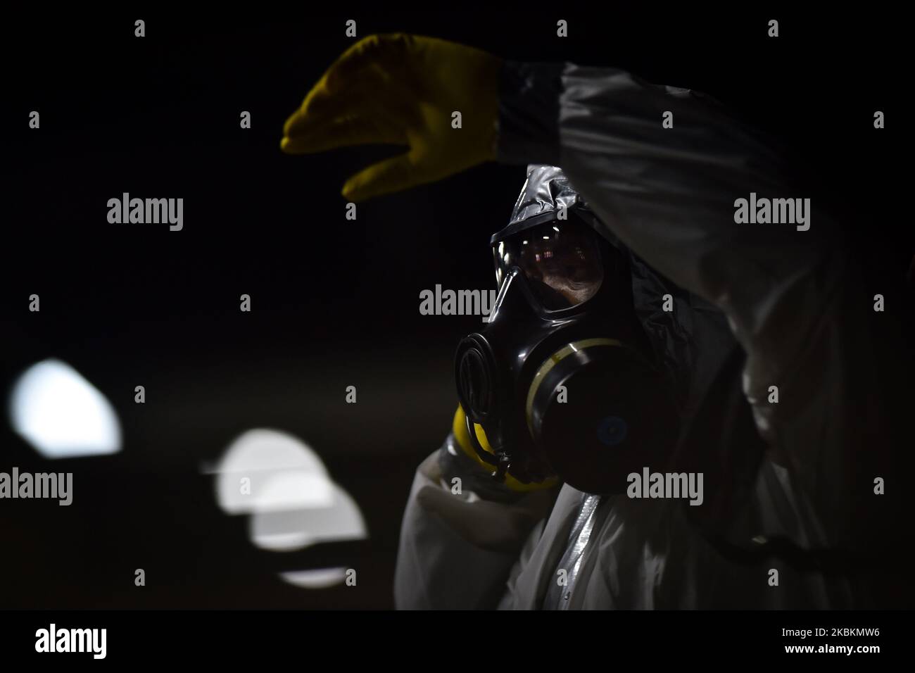 Military soldiers from the Brazilian Army's Chemical, Biological, Radiological and Nuclear Defense Company work on the disinfection of the Central Subway Station in Brasília, Brazil, on March 28, 2020. Decontamination actions in places with high passenger traffic are part of the prevention and fight against the Coronavirus (COVID-19). (Photo by Andre Borges/NurPhoto) Stock Photo