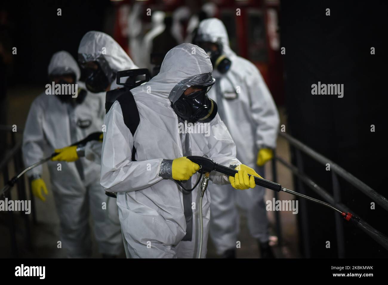 Military soldiers from the Brazilian Army's Chemical, Biological, Radiological and Nuclear Defense Company work on the disinfection of the Central Subway Station in Brasília, Brazil, on March 28, 2020. Decontamination actions in places with high passenger traffic are part of the prevention and fight against the Coronavirus (COVID-19). (Photo by Andre Borges/NurPhoto) Stock Photo