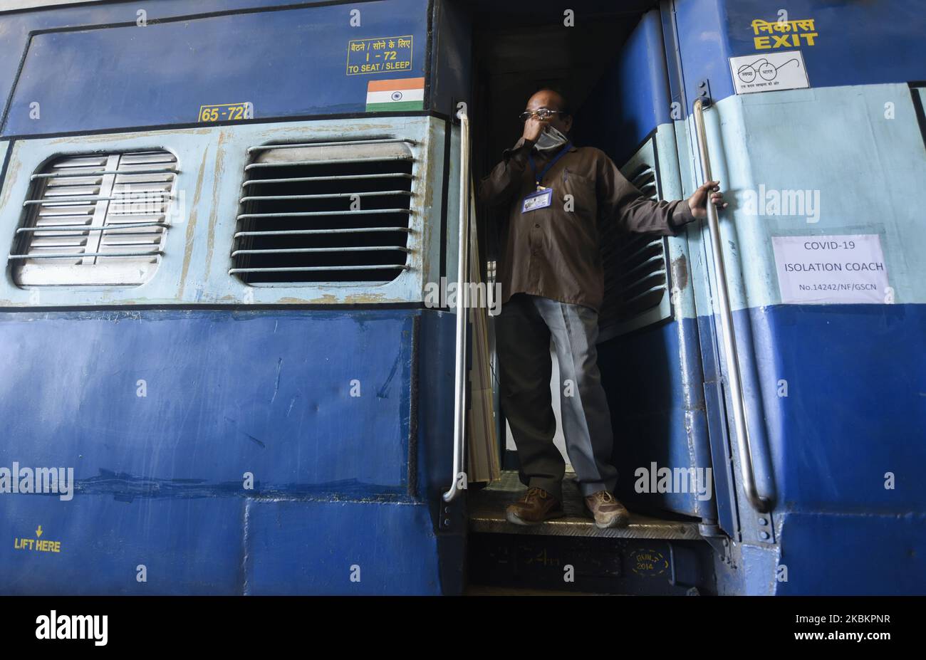 A Staff member of Northeast Frontier Railway (NFR) standing on a