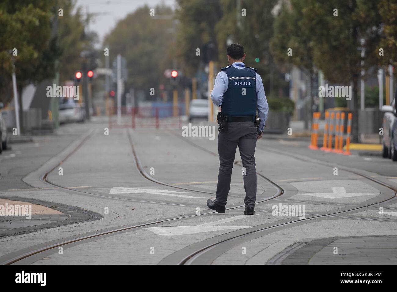 A police officer patrols an empty street in Christchurch, New Zealand, on April 01, 2020.Â New Zealand has been lockdown for four weeksÂ in an attempt to minimize the spread of the Covid-19 virus since the 25th of March. There are currently 708 cases of COVID-19 in New Zealand and one person died as a result of the virus.Â Â (Photo by Sanka Vidanagama/NurPhoto) Stock Photo