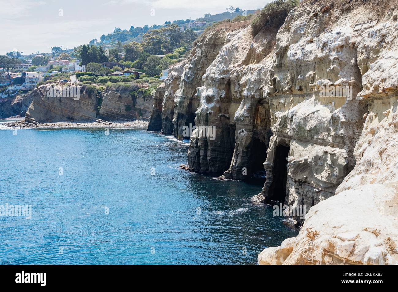 La Jolla sea caves with cliffside erosion and Sedimentary rock layers. Travelling and discovering California nature and geology Stock Photo