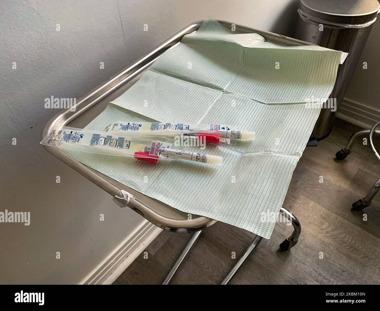 A view of a Covid-19 kit of COPAN Diagnostics, based in Murrieta, CA, USA, on April 4, 2020. One method for testing Covid-19 is by using two large bacterial-transport swobs that extract samples from the throat and nasal cavity. (Photo by John Fredricks/NurPhoto) Stock Photo