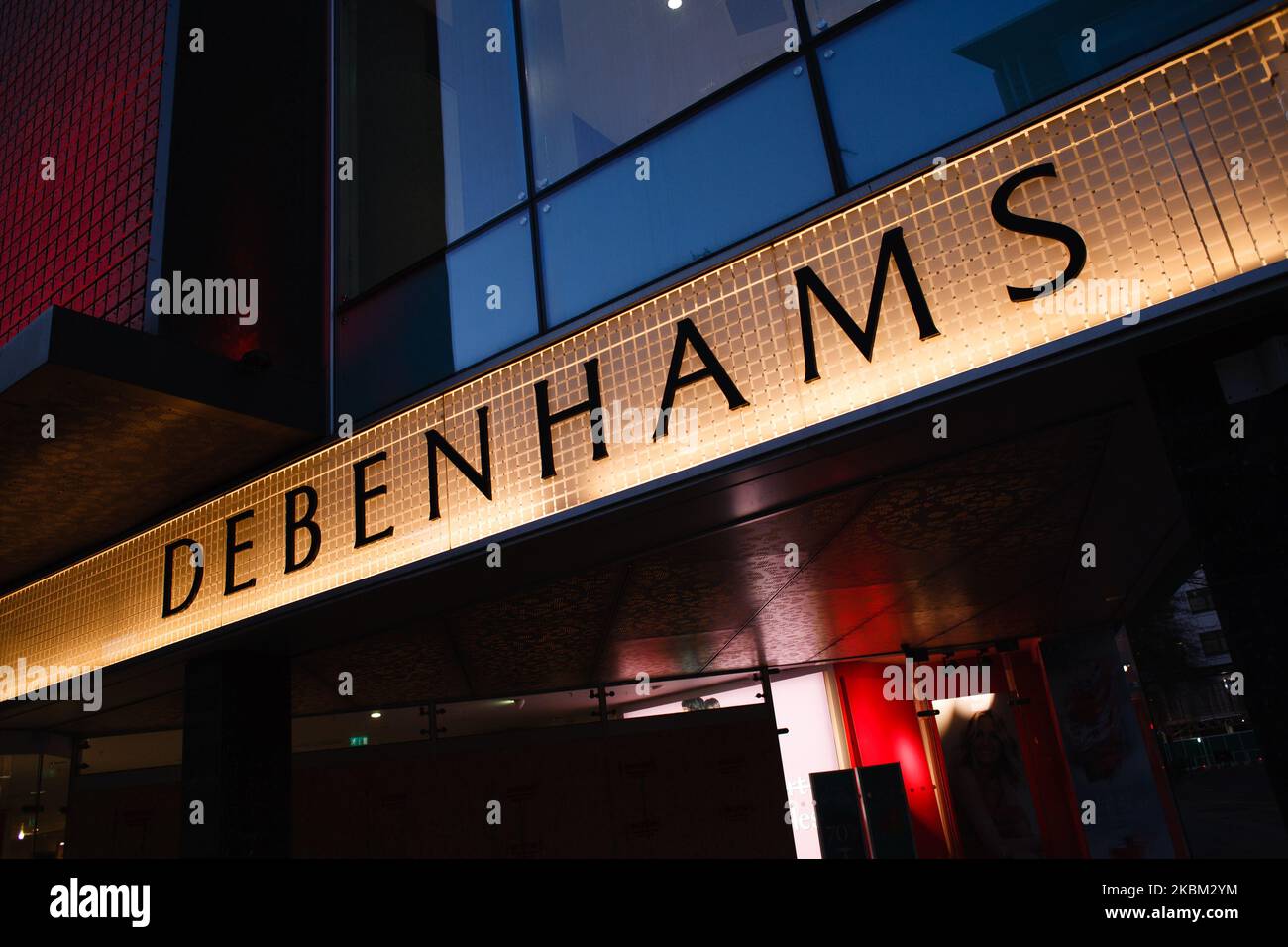 The flagship branch of department store chain Debenhams stands on a near-deserted Oxford Street in London, England, on April 6, 2020. Debenhams announced today that it was having to file for administration as a consequence of having to shut all its stores across the UK under the covid-19 coronavirus lockdown. This is to be the second time in a year that the struggling retailer has filed for administration. Its present predicament comes not long after its permanent closure of 22 stores, resulting in more than 700 job losses, with a further 28 already slated for closure in 2021. Britain meanwhil Stock Photo