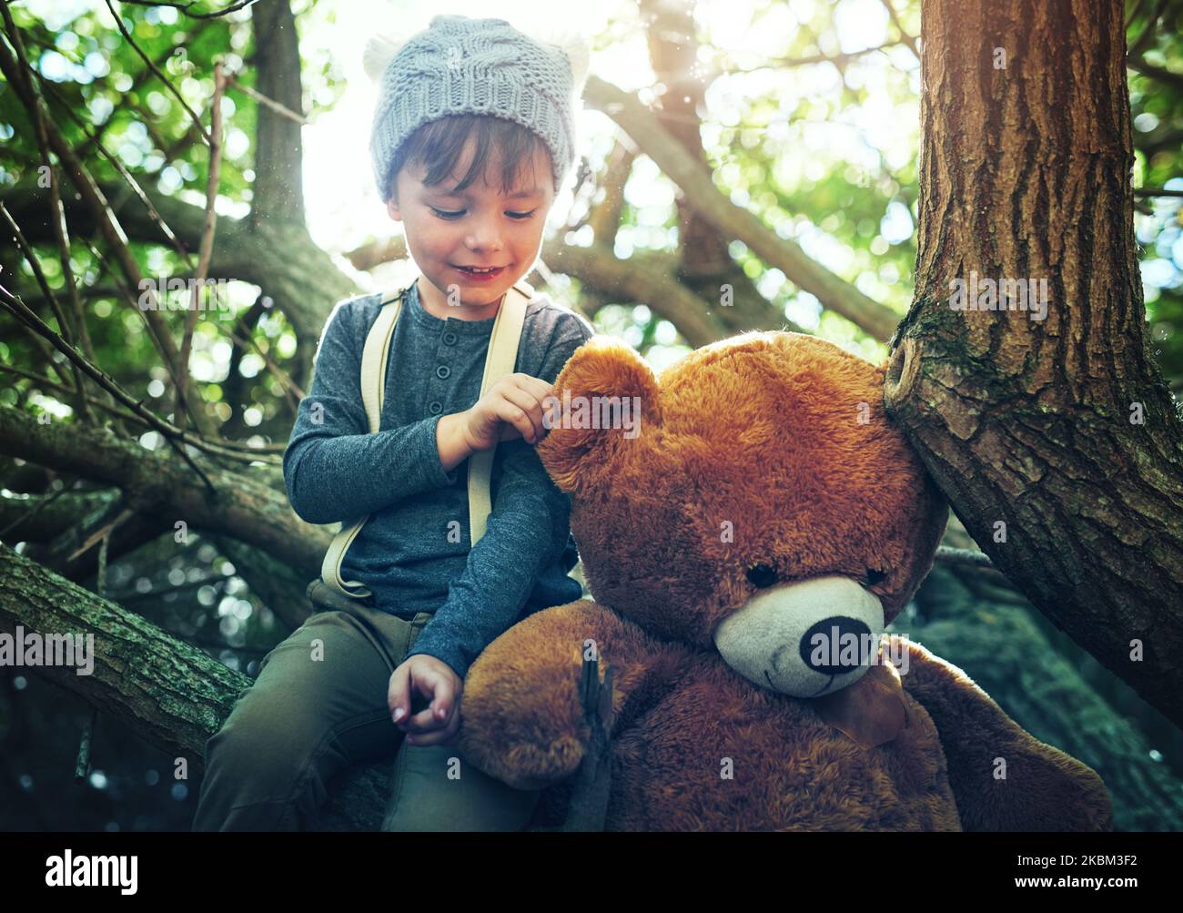 Teddy Playing Boy playing with toy and teddy bear hi-res stock photography and images ...