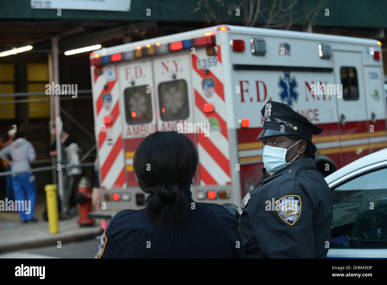 Police guard the entrance to Mount Sinai Hospital in uptown Manhattan