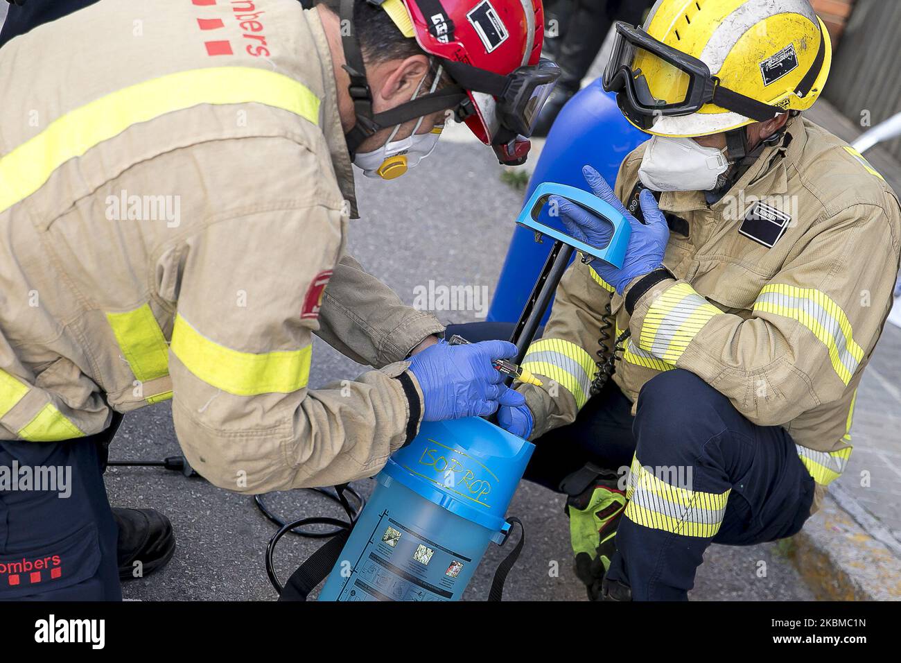 Members of the Fire Department of the Generalitat de Catalunya (Autonomous Government), prepare with NBQ clothing to disinfect a nursing home in La Garriga, near Barcelona, during the Coronavirus - Covid19 crisis in Barcelona, Catalonia, Spain, the April 11, 2020. (Photo by Miquel Llop/NurPhoto) Stock Photo