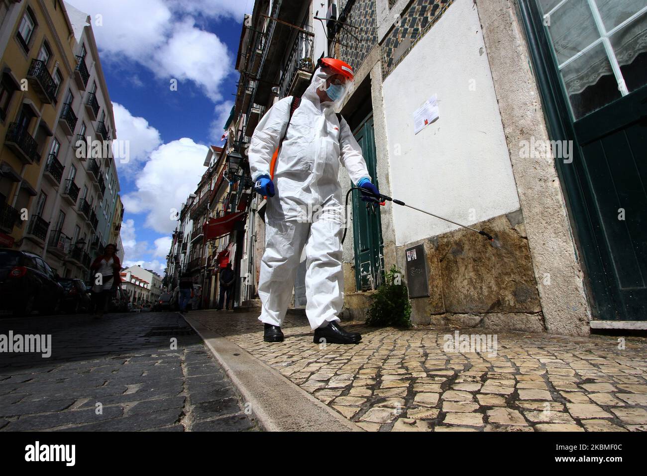 Workers from the Santa Maria Mayor Communal Council carry out cleaning