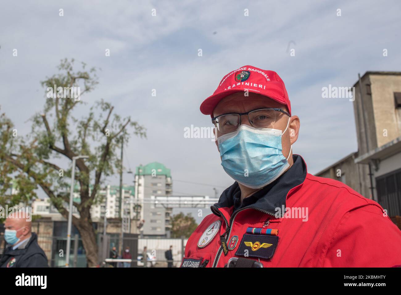 People at work at the entrance of the OGR hospital on April 18, 2020 in Turin, Italy. The 'Officine grandi riparazioni OGR' will house a large temporary hospital with an intensive care unit, sub-intensive care unit and places for hospitalization. (Photo by Mauro Ujetto/NurPhoto) Stock Photo