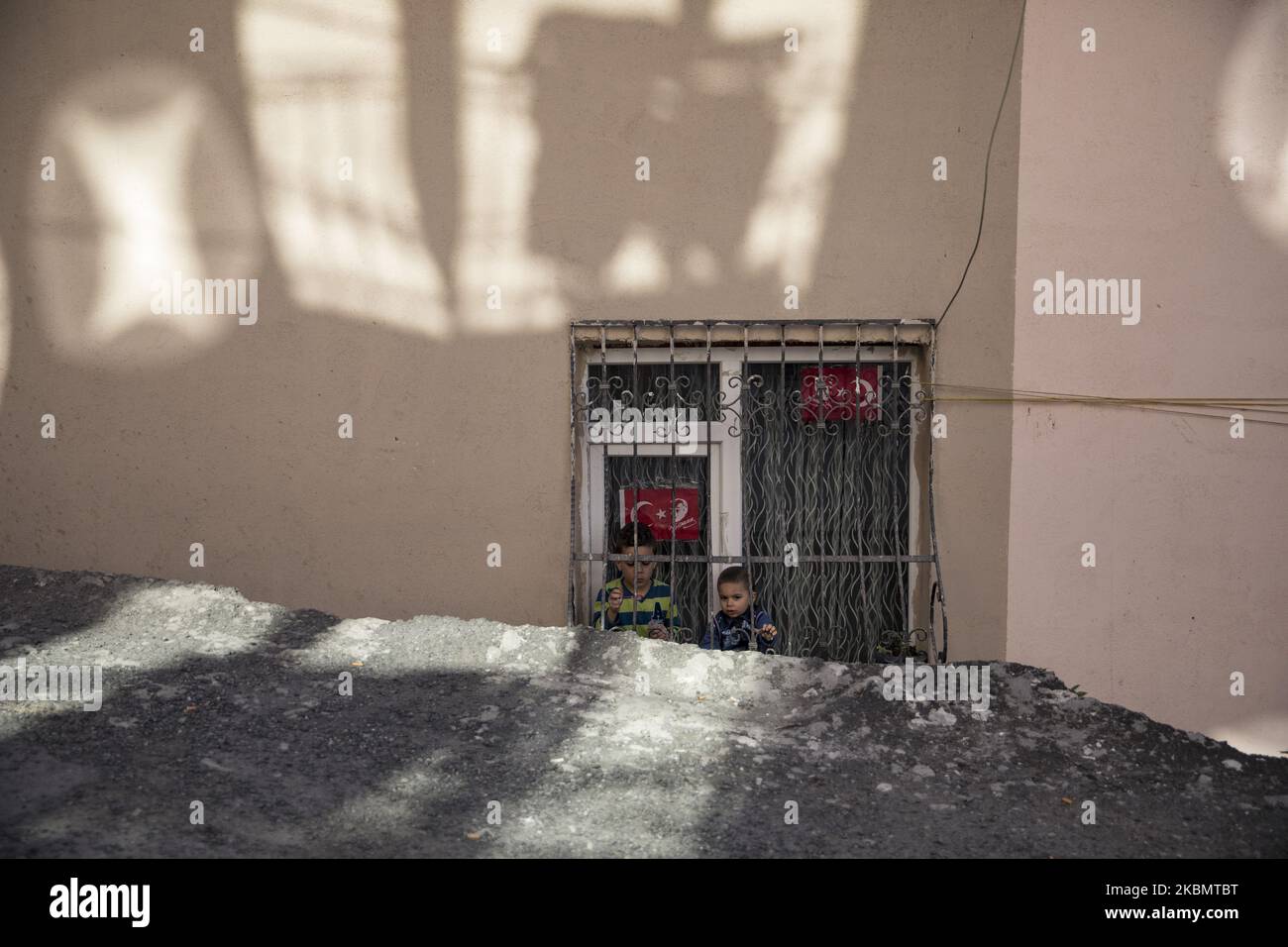 People celebrate with Turkish flags on their balconies to mark the National Sovereignty and Children's Day during a lockdown in Istanbul, Turkey, 23 April 2020. The Turkish Ministry of Interior announced that Istanbul and 30 major cities will be under lockdown from 23 until 26 April 2020 amid the ongoing coronavirus COVID-19 pandemic. Turkey suspended all international flights and all inter-city travels are subject to local authorities' permission as part of measures to prevent the spread of the pandemic COVID-19 disease caused by the SARS-CoV-2 coronavirus. (Photo by Cem TekkeÅŸinoÄŸlu/NurPho Stock Photo