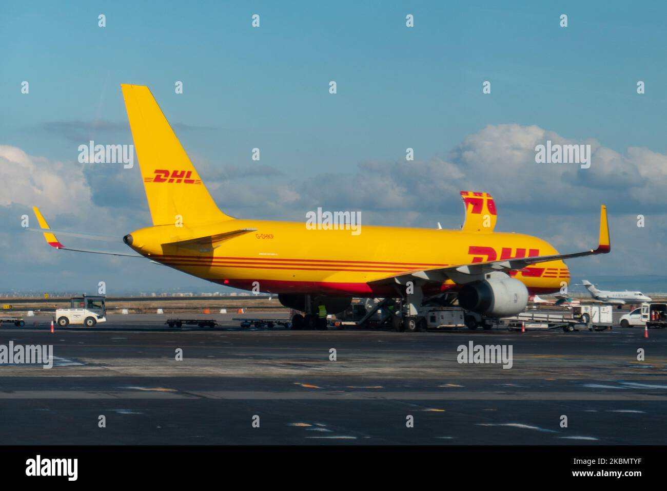 DHL Air Boeing 757 Cargo airplane as seen during the day with the cargo door open at Thessaloniki International Airport Makedonia SKG LGTS in Greece. The Boeing B757 or 757-200F freight aircraft has the registration G-DHKP and is powered by 2x Roll Royce RR jet engines. DHL Aviation is a division of DHL Express owned by Deutsche Post and is an Express Logistics air freight carrier. During the Covid-19 Coronavirus pandemic, most of the passenger airlines grounded their fleet but the cargo airlines increased the flights to transport goods and supplies. March 16, 2020 (Photo by Nicolas Economou/N Stock Photo