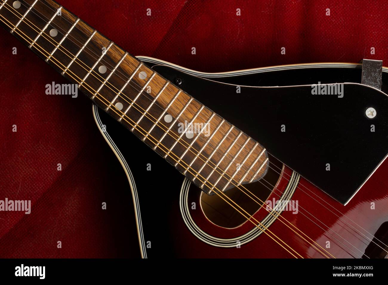 Detail of the soundbox and neck of a mandolin Stock Photo