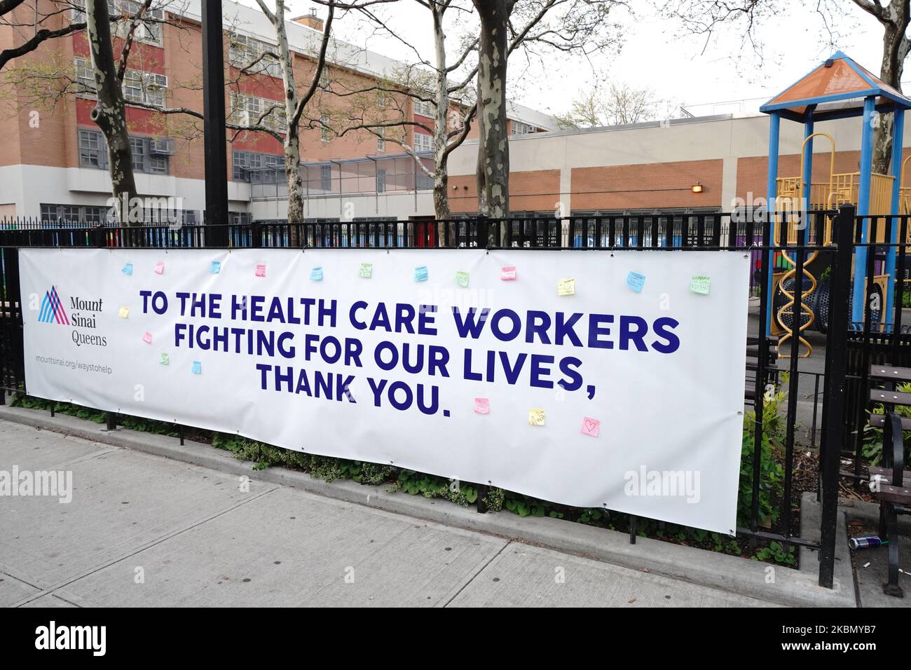 A view of a message of support in front of Mount Sinai Queens Long