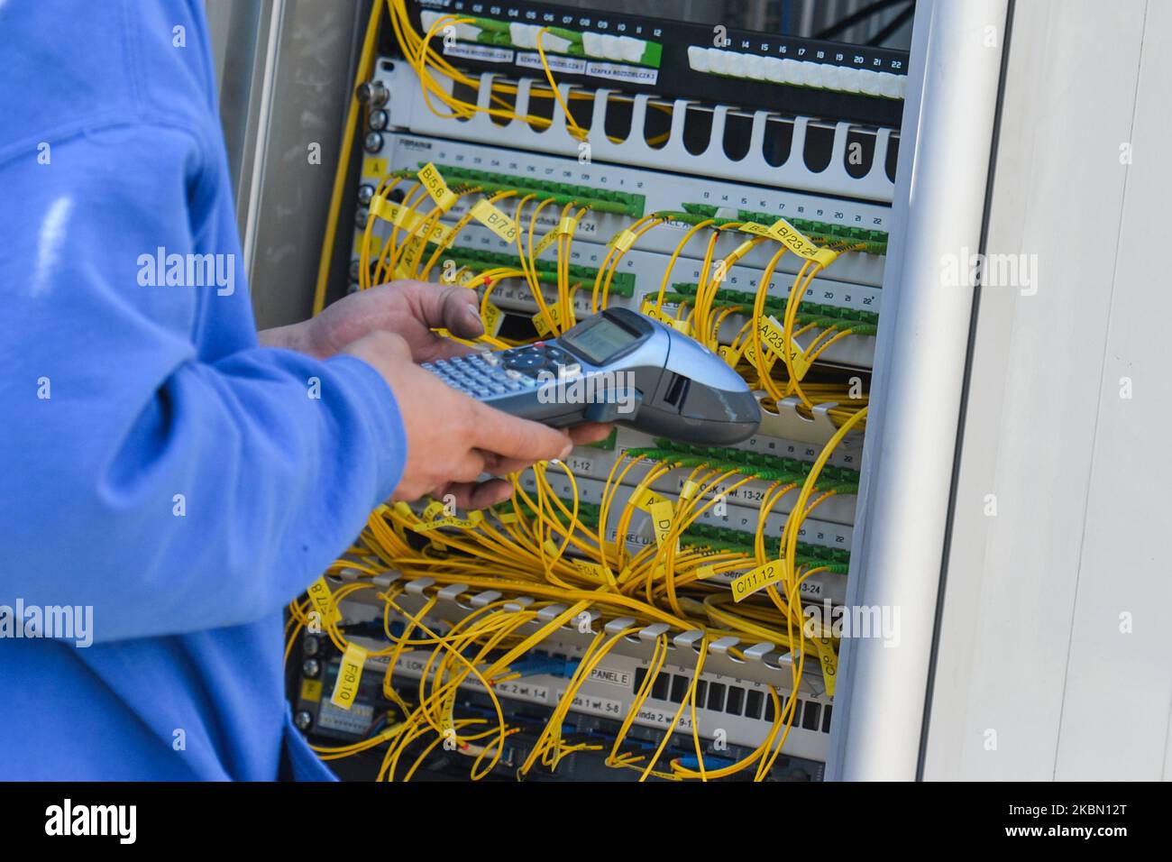 A controller checking the electrical systems in Krakow during the coronavirus pandemic. On Monday, April 27, 2020, in Krakow, Poland. (Photo by Artur Widak/NurPhoto) Stock Photo