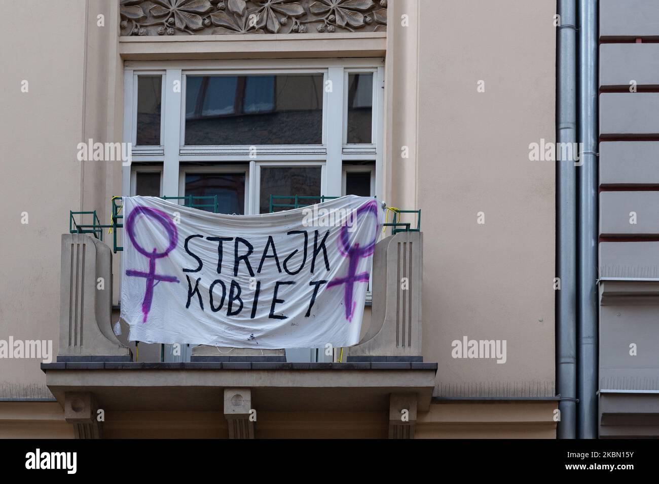 A poster of Women's Strike in Poland is seen in a window of residential house in a centre of Krakow during Covid-19 pandemic on April 27, 2020. Women started a protest, also called Polish Hell, against an abortion policy currently discussed in Polish parliament which abolishes abortion even in case of health problems. (Photo by Dominika Zarzycka/NurPhoto) Stock Photo