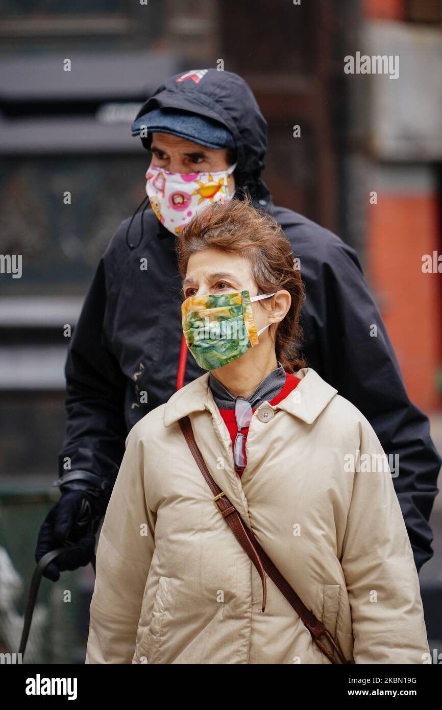 A view of a person wearing a mask in Manhattan New York City, USA