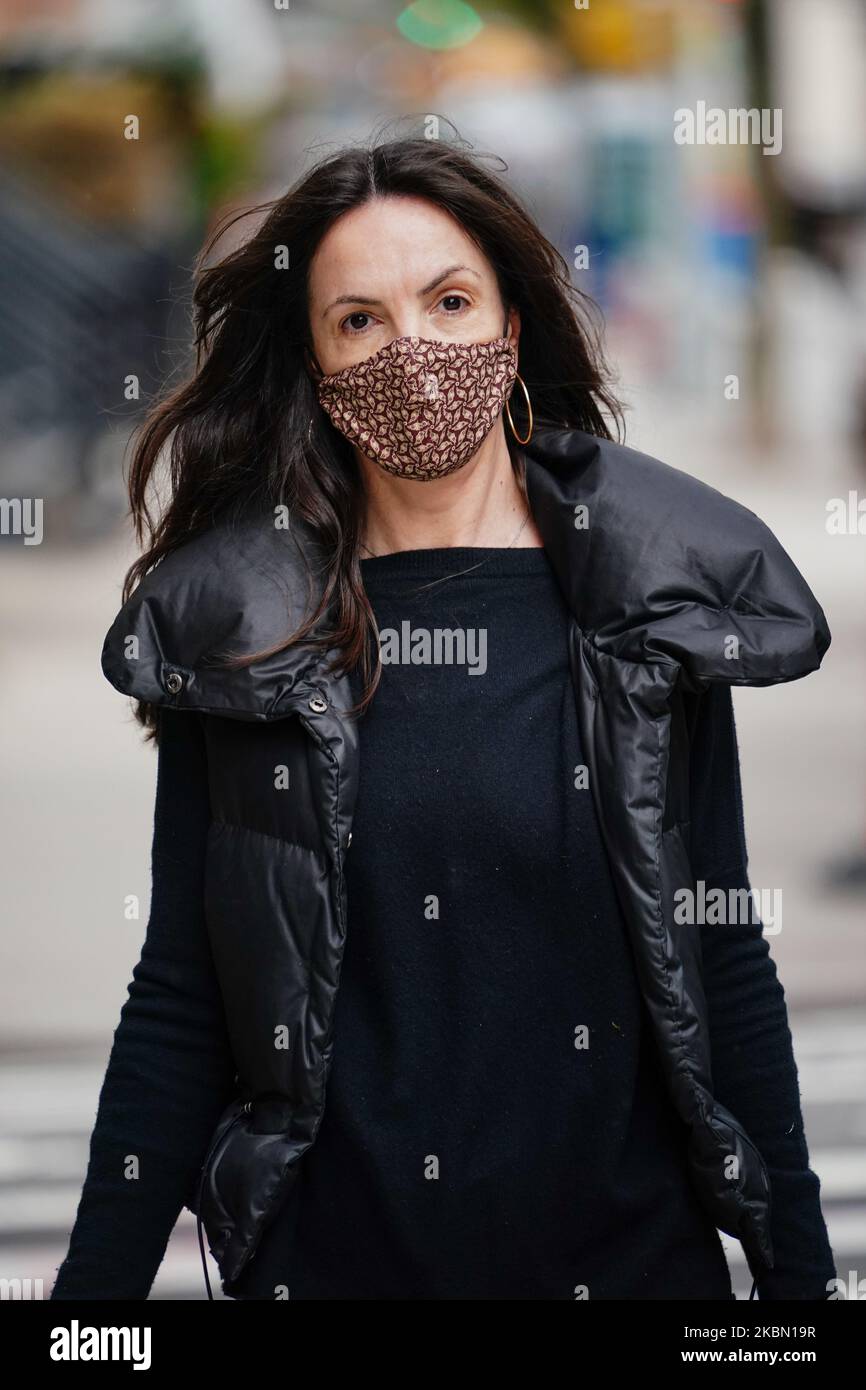 A view of a person wearing a mask in Manhattan New York City, USA