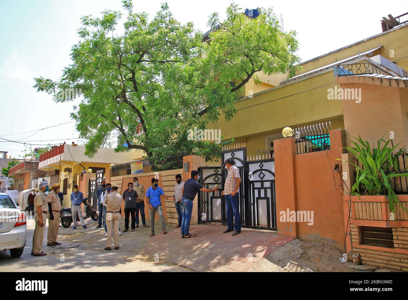 People are seen outside the house of Bollywood actor Irrfan Khan following the news of his death at Mumbai's Kolikilaben Dhirubhai Ambani Hospial, in Jaipur, Rajasthan, India. April 29,2020. Irrfan Khan , one of the India's finest and versatile actors, lost his battle with the rare form of cancer , died in a Mumbai hospital at the age of 54 . (Photo by Vishal Bhatnagar/NurPhoto) Stock Photo