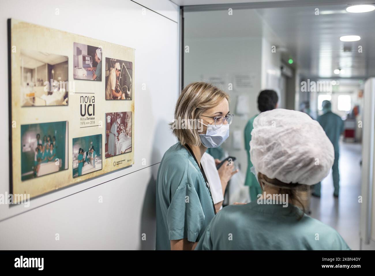 Healthcare personnel attend to a patient admitted to the ICU Intensive