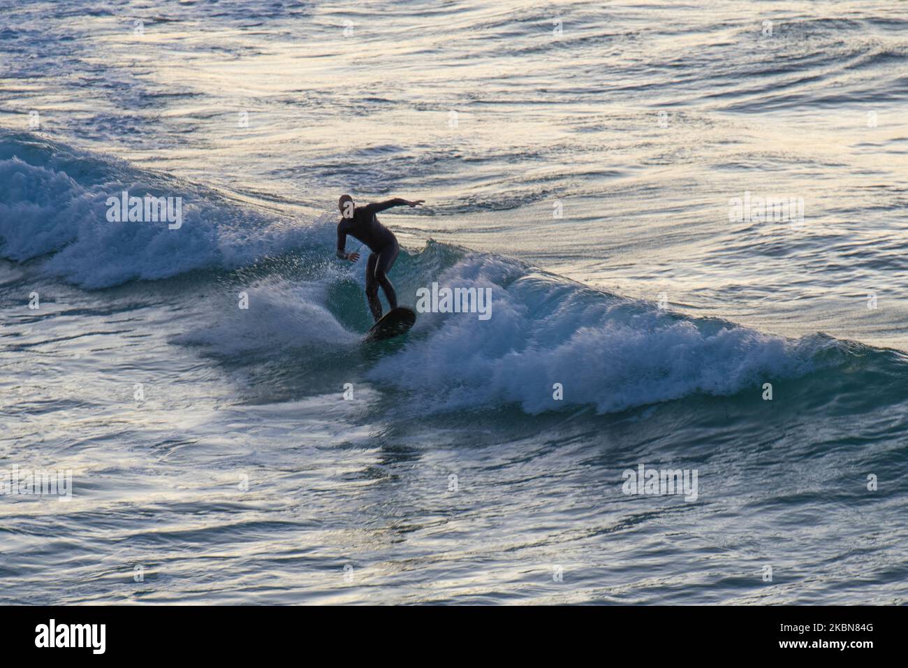 A general view of surfer try to catch a wave on Bondi beach on May 03, 2020 in Sydney, Australia. In Sydney Amid Coronavirus As Australian Coronavirus Infection Rate Continues To Decline. (Photo by Izhar Khan/NurPhoto) Stock Photo