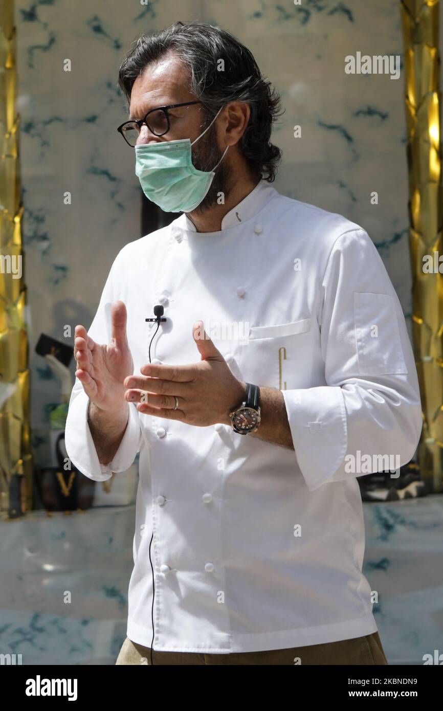 Italian chef Carlo Cracco is seen in front of his restaurant in Duomo area, Galleria Vittorio Emanuele II, Milan, May 07, 2020. (Photo by Mairo Cinquetti/NurPhoto) Stock Photo