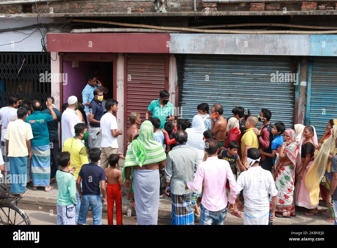 People Waiting Up To Receive Free Food During Nationwide Lockdown On