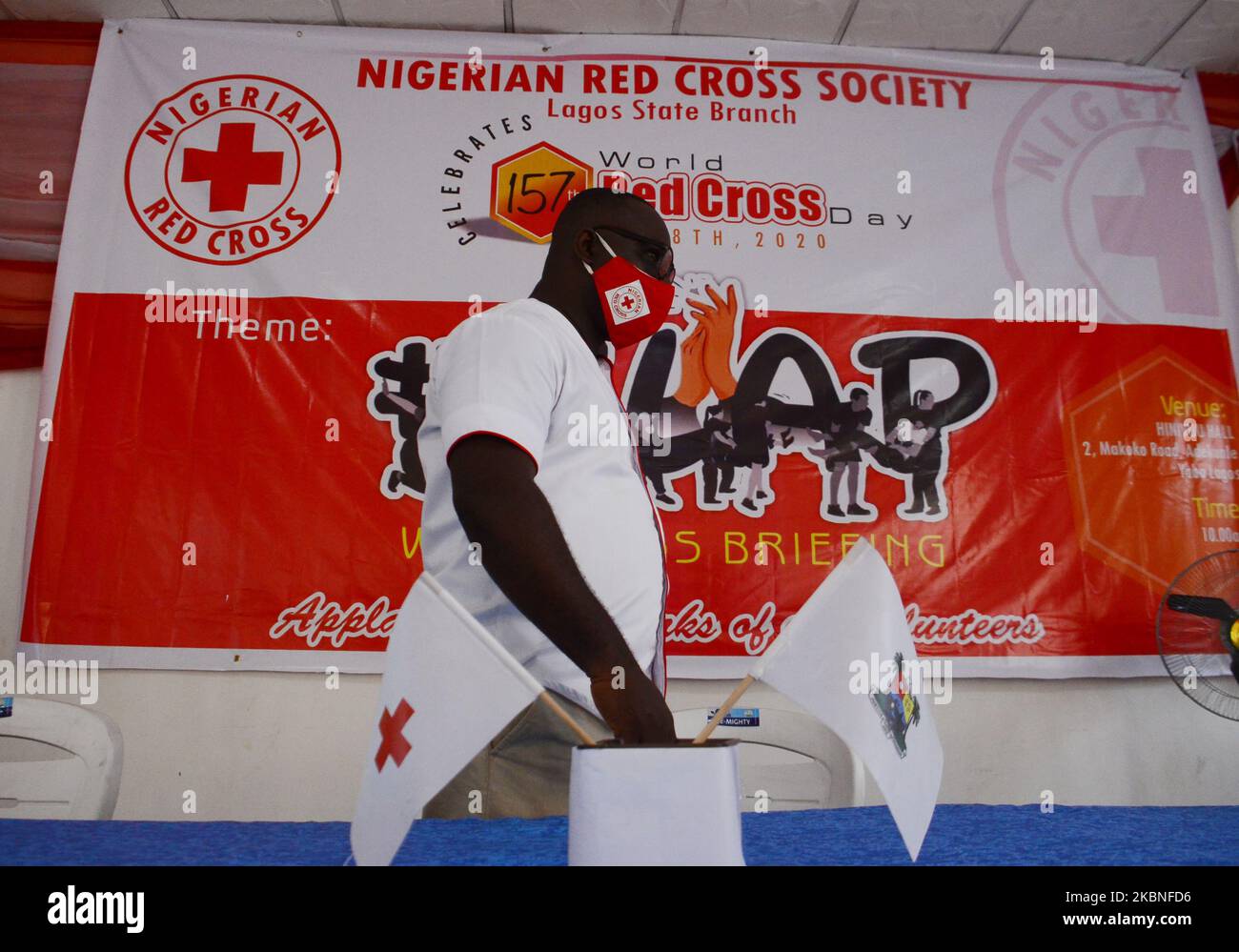 An official of the Nigerian Red Cross Society (NRCS) walk pass the red