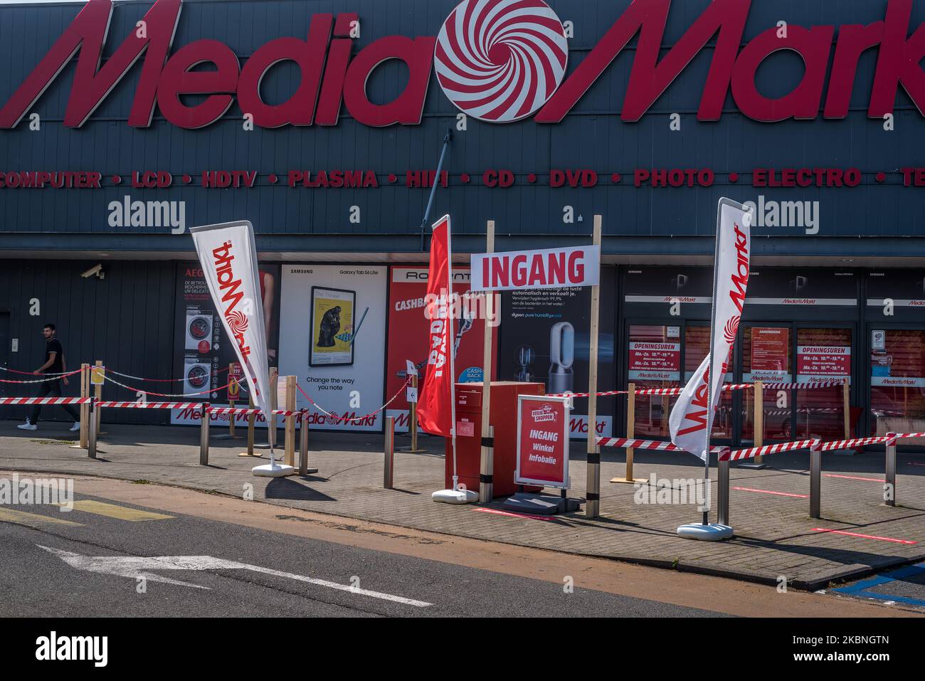 The entrance of Media markt with stickers to help people keep their  distance in Oostakker, Belgium